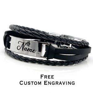 Mens bracelet with silver name plate .